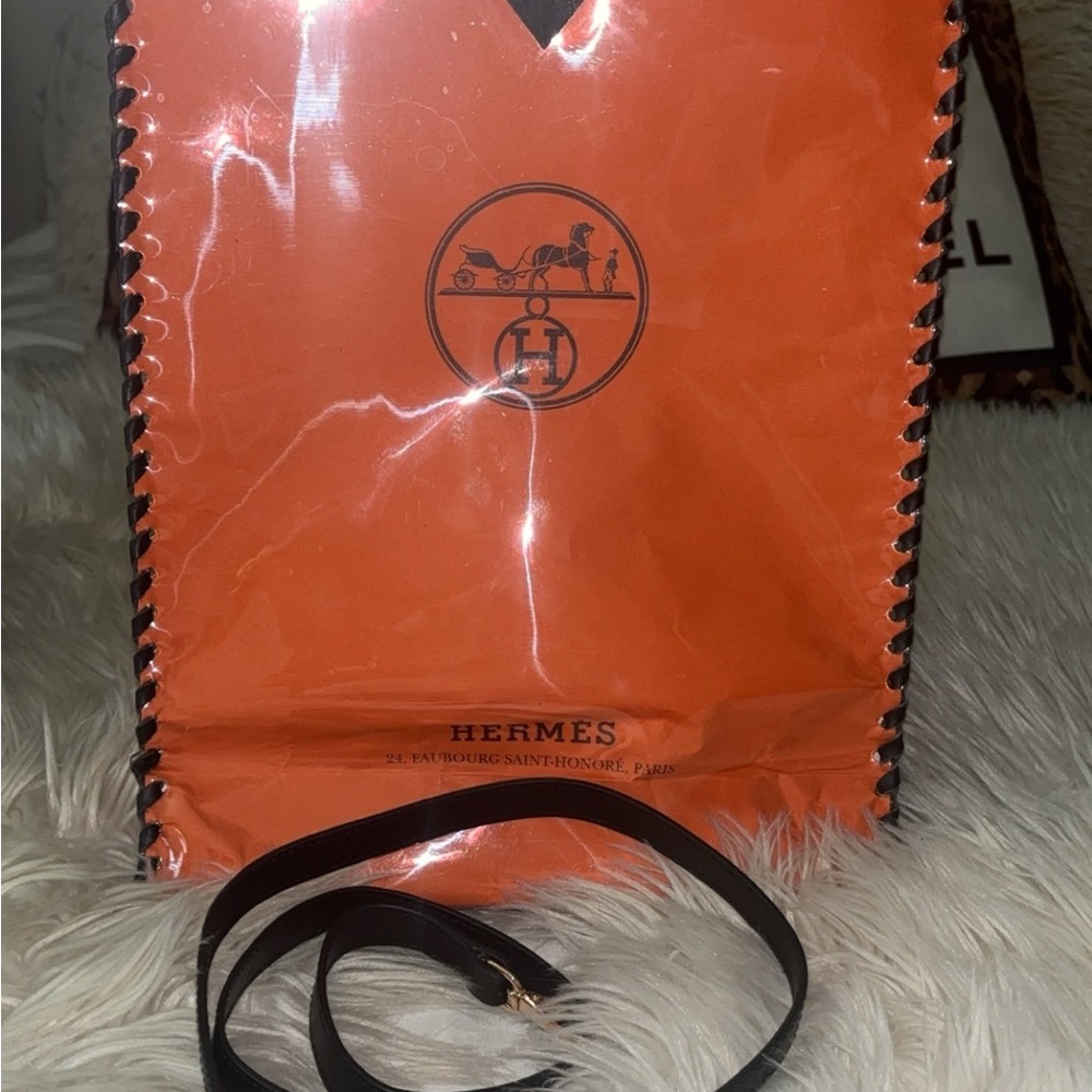 Hermès Vibrant Orange Bag with Dark Strap